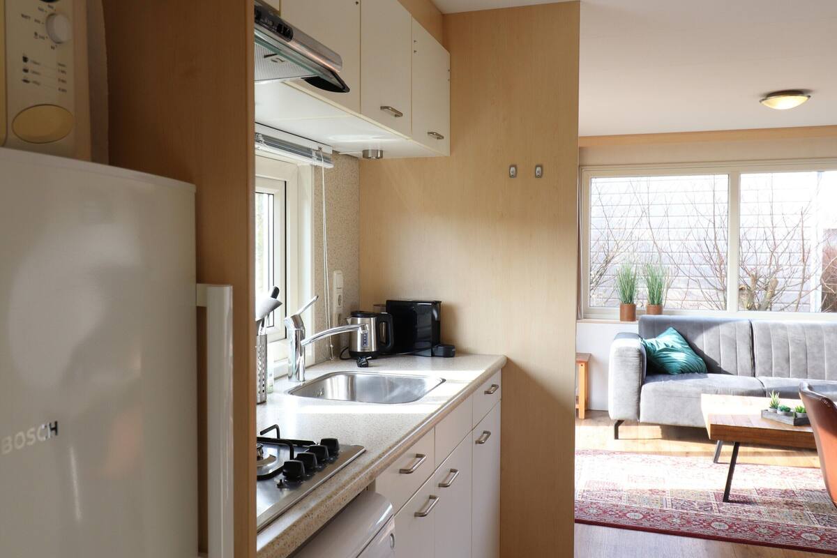 Deluxe Chalet, 2 Bedrooms | Private kitchen | Microwave, dishwasher, coffee/tea maker, electric kettle