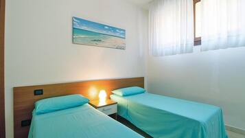 Deluxe Apartment, 2 Bedrooms | 4 bedrooms, individually furnished, bed sheets