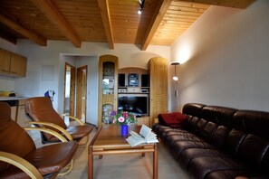 Apartamento conforto, 3 quartos | Sala de estar