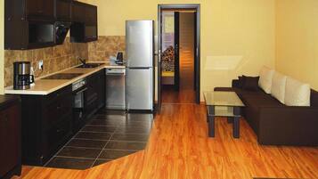 Comfort House, 3 Bedrooms | Private kitchen | Fridge, microwave, oven, dishwasher