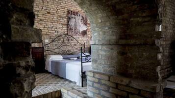 Deluxe Apartment, 1 Bedroom | 23 bedrooms, individually furnished, iron/ironing board, bed sheets