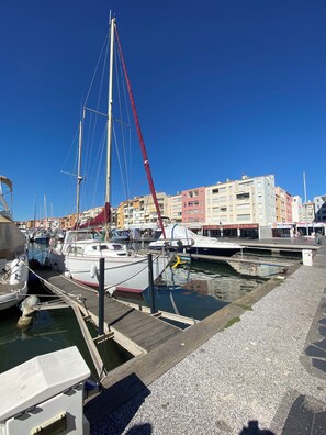 Enjoy boating and waterfront activities from this marina with sailboats and motorboats.