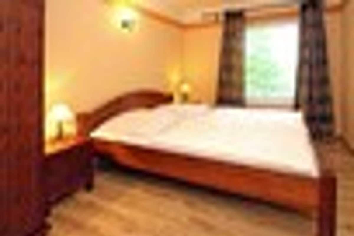 Casa clássico, 4 quartos | 2 quartos, individualmente mobiliados, roupa de cama
