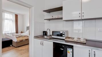 Comfort Apartment, 1 Bedroom | Private kitchen | Fridge, coffee/tea maker, electric kettle