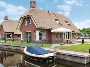 Romantic House, 4 Bedrooms | Exterior - Atmospheric Villa With Nice Garden, in a Holiday Park at the Water in Friesland (Idskenhuizen)