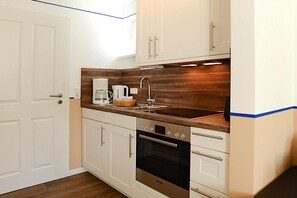 Departamento Deluxe, 1 habitación | Cocina privada | Refrigerador, horno, cafetera y tetera y tetera eléctrica