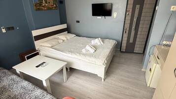 Economy Double Room | Desk, laptop workspace, iron/ironing board (on request), WiFi (free)