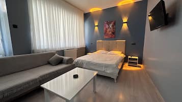 Individually furnished, desk, laptop workspace, iron/ironing board