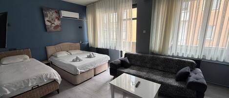 Individually furnished, desk, laptop workspace, iron/ironing board