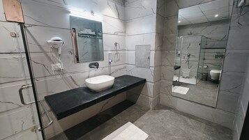 Luxury Room, Non Smoking | Bathroom | Shower, hair dryer, slippers, towels