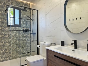 Shower, hair dryer, towels, soap