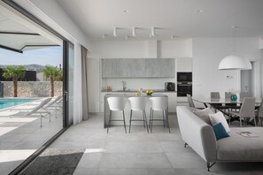 Dining - Villa Alba-200 meters from the beach, chic home with a heated pool, gym, and play area with a PS4, two bikes, table tennis, and breathtaking views of the island and sea (Seget Vranjica)