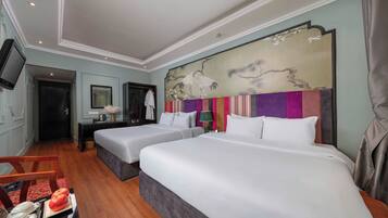 Luxury Triple Room, City View | In-room safe, desk, blackout drapes, soundproofing