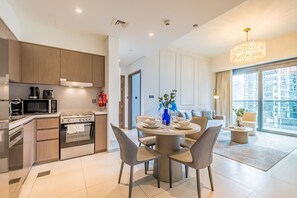Fridge, microwave, oven, stovetop - Chic 1BR Apartment in Act One Act Two Tower 1, Downtown Dubai by Deluxe Holiday Homes (Dubai)