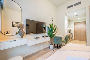 In-room safe, iron/ironing board, free WiFi, bed sheets - Lovely Studio Apartment at Azizi Riviera 46 in Al Merkadh by Deluxe Holiday Homes (Dubai)