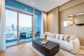 TV - Charming 2BR in Bloom Heights, Jumeirah Village Circle by Deluxe Holiday Homes (Dubai)