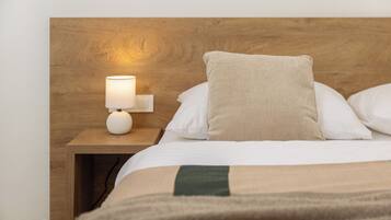 Casa familiar, vista parcial al mar | 2 habitaciones, minibar, tabla de planchar con plancha y wifi gratis
