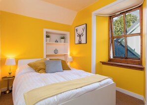 Habitación doble Deluxe | Muebles diferentes y ropa de cama 