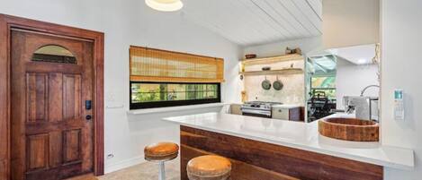 Fridge, stovetop, dishwasher, coffee/tea maker