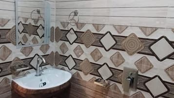 Deluxe Double Room, River View | Bathroom | Shower, rainfall showerhead, towels, soap