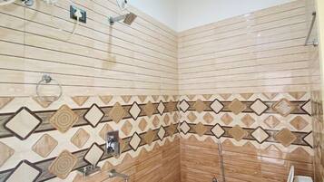 Deluxe Double Room, River View | Bathroom | Shower, rainfall showerhead, towels, soap
