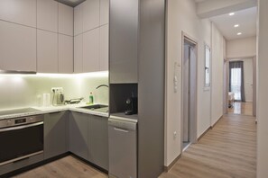 Fridge, microwave, oven, stovetop - Athenian Escape 2BR, 2BA, Stylish Fully Reno Apt (Vironas)