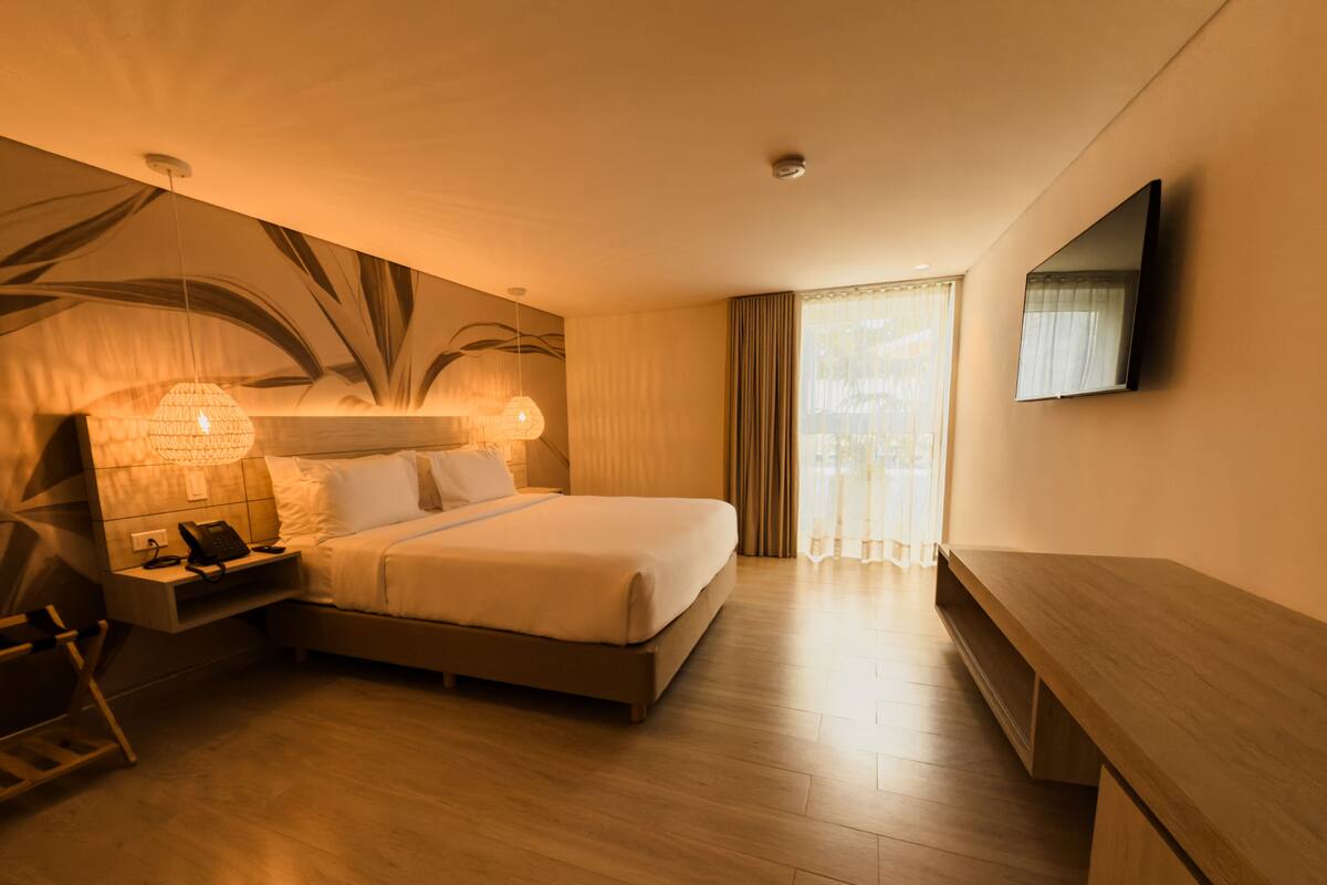 Habitación estándar doble, vistas a la piscina | Caja fuerte, cortinas opacas, cunas gratuitas y wifi gratis