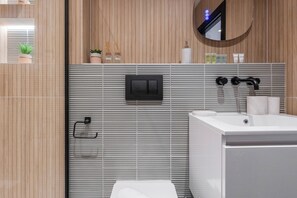 Hair dryer, towels, soap, toilet paper