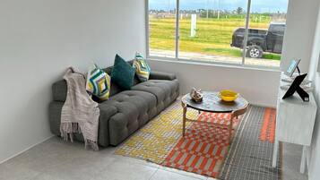 Casa Comfort | Area soggiorno | TV a schermo piatto