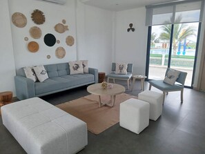 Hus – deluxe | Oppholdsområde | Flatskjerm-TV