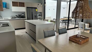 Premium House | Private kitchen | Fridge, microwave, electric kettle, cookware/dishes/utensils