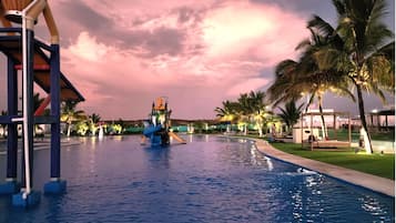 Outdoor pool, open 6:00 AM to 10:30 PM, pool umbrellas