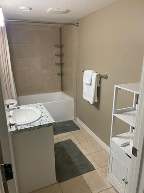 Hair dryer, towels, soap, shampoo