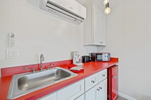 Microwave, coffee/tea maker, dining tables - The Pirate's Den Above Cedar Key Island Bakery (Cedar Key)