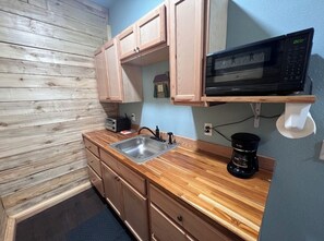 Fridge, microwave, coffee/tea maker, toaster