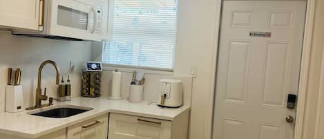 Coffee/tea maker, fridge, microwave, electric kettle