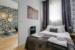 1 dormitorio, tabla de planchar con plancha, wifi y ropa de cama