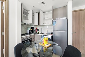 Apartament exclusiu | Cuina privada | Frigorífic gran, microones, forn i placa de cuina