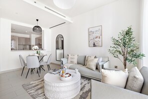 Elite Apartment | Living area | 50-inch Smart TV with digital channels
