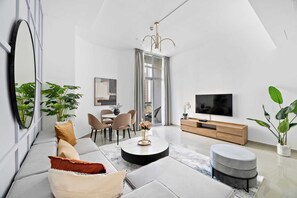 Elite Apartment | Living area | 50-inch Smart TV with digital channels