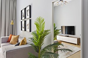 Appartement Prestige | Aire de séjour | Téléviseur connecté de 50 po avec télévision par câble