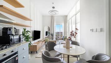 Executive Apartment | Living area | 50-inch Smart TV with digital channels