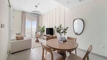 Premier Apartment | Living area | 50-inch Smart TV with digital channels