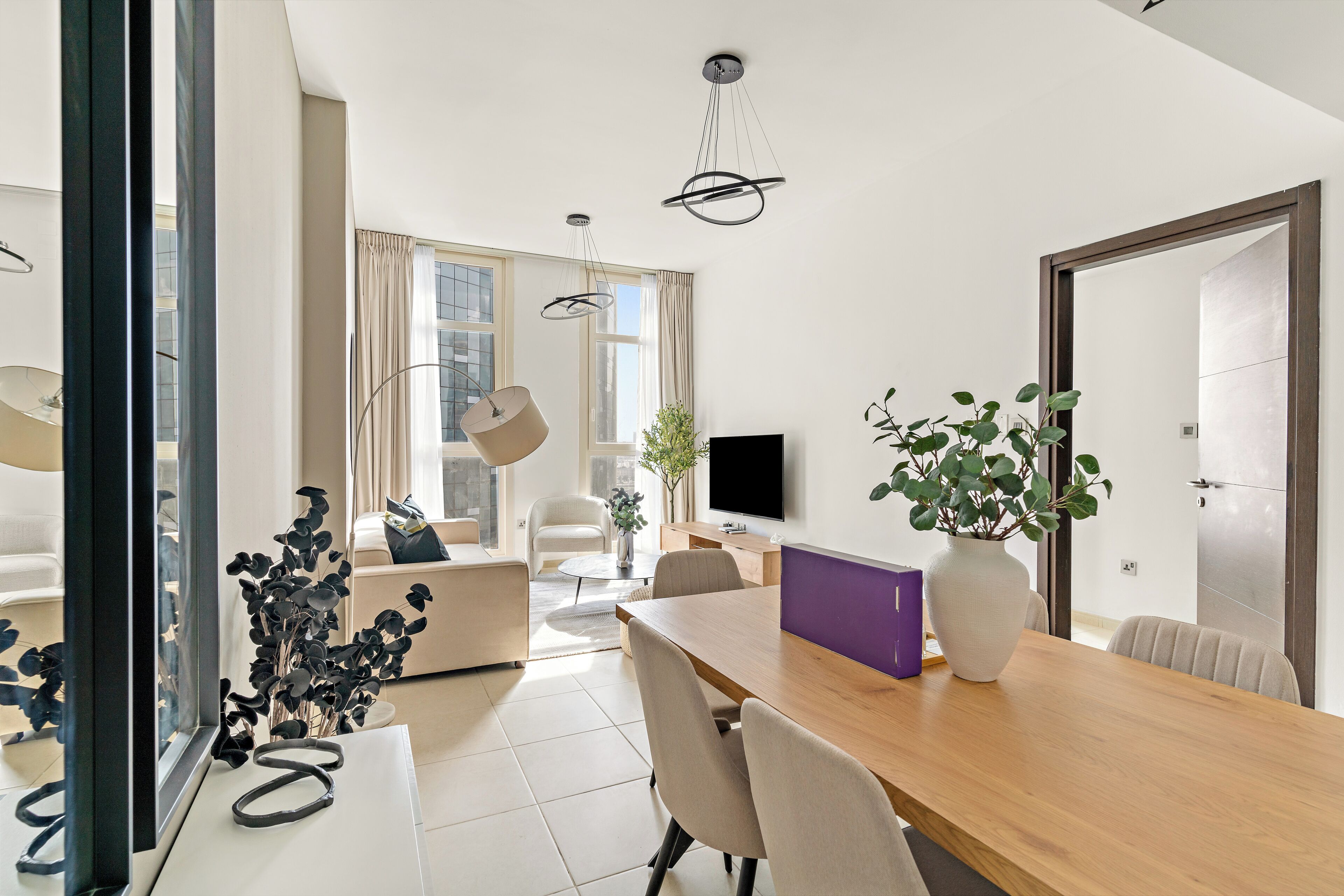Elite Apartment | Living area | 50-inch Smart TV with digital channels