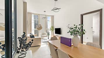Elite Apartment | Living area | 50-inch Smart TV with digital channels