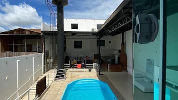 Indoor pool, open 7:00 AM to 10:00 PM, pool loungers