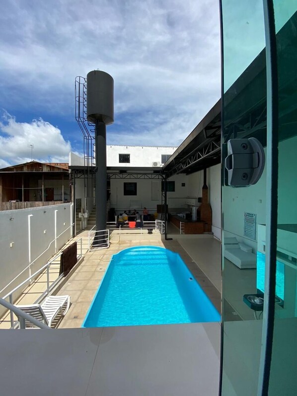 Indoor pool, open 7:00 AM to 10:00 PM, sun loungers - Pousada Torre Forte (Rio Branco)