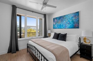 1 bedroom, desk, iron/ironing board, travel crib