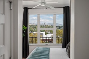 1 bedroom, desk, iron/ironing board, travel crib