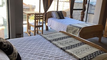 Family Triple Room, City View | Laptop workspace, free WiFi